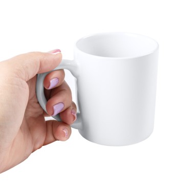 Taza de cerámica especial para sublimación con capacidad de 250 ml. Personaliza tu taza para tu empresa o para regalar. 
Prese